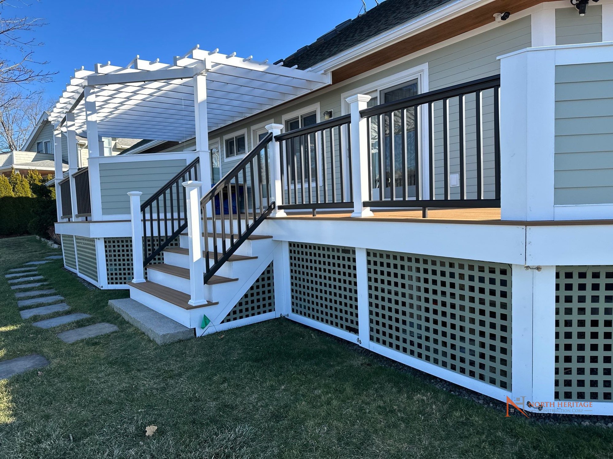 Completed multi-level composite deck with custom railings